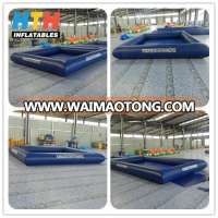 dark blue floating inflatable boat swimming pool